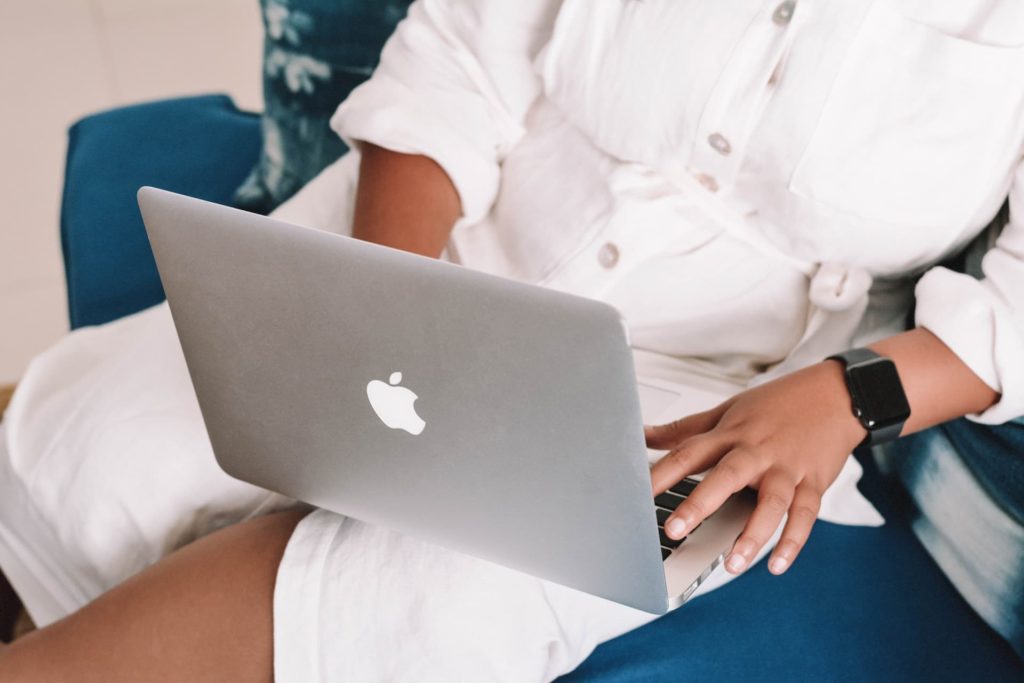 Woman on a Macbook laptop